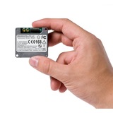 Iridium 9602N SBD transceiver shown in hand for size reference